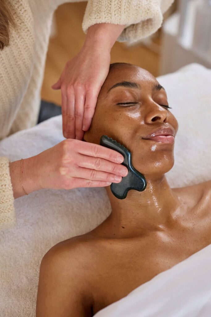 Holistic Gua Sha facial therapy session